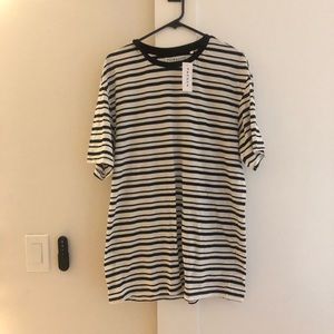 Mens black/white stripe tee shirt. New with tags. Size large. Bought for $17.95